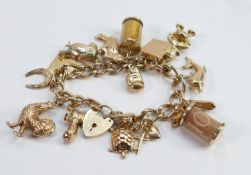 9ct gold bracelet with 14 9ct gold charms, 43.9g: