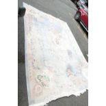 Very Large Chinese Tasseled Rug: some areas of fading noted. 334cm x 480cm, please be advised item