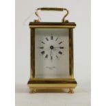 Brass carriage clock dial reads Bormond Freres Bicester: Winds, ticks and runs, complete with key.