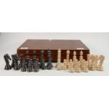 Cased Ceramic Chess Set: height of King 9.4cm