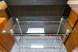 Glass top side table with glass shelf below: Measuring 120cm x 46cm x 75cm high.
