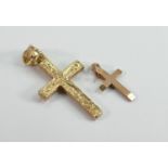 9ct gold cross with a smaller example, 3.3g: