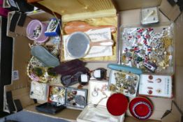 A collection of Vintage Costume Jewelry including: beads, brooches, earrings together with vintage