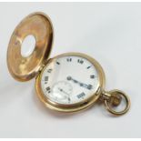 Gold plated half hunter pocket watch: in ticking order.