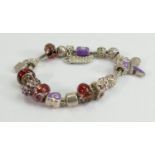 Silver modern style bracelet :set with various coloured stones, 65g.