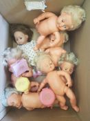 A group of vintage dolls: mostly unclothed, together with 3 'Polly Pockets' small cased sets, 2