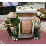 A large ceramic plant stand in the form of an Indian Elephant: