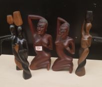 Five African hardwood hand carved figures of tribal ladies: tallest 35cm in height.