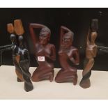 Five African hardwood hand carved figures of tribal ladies: tallest 35cm in height.