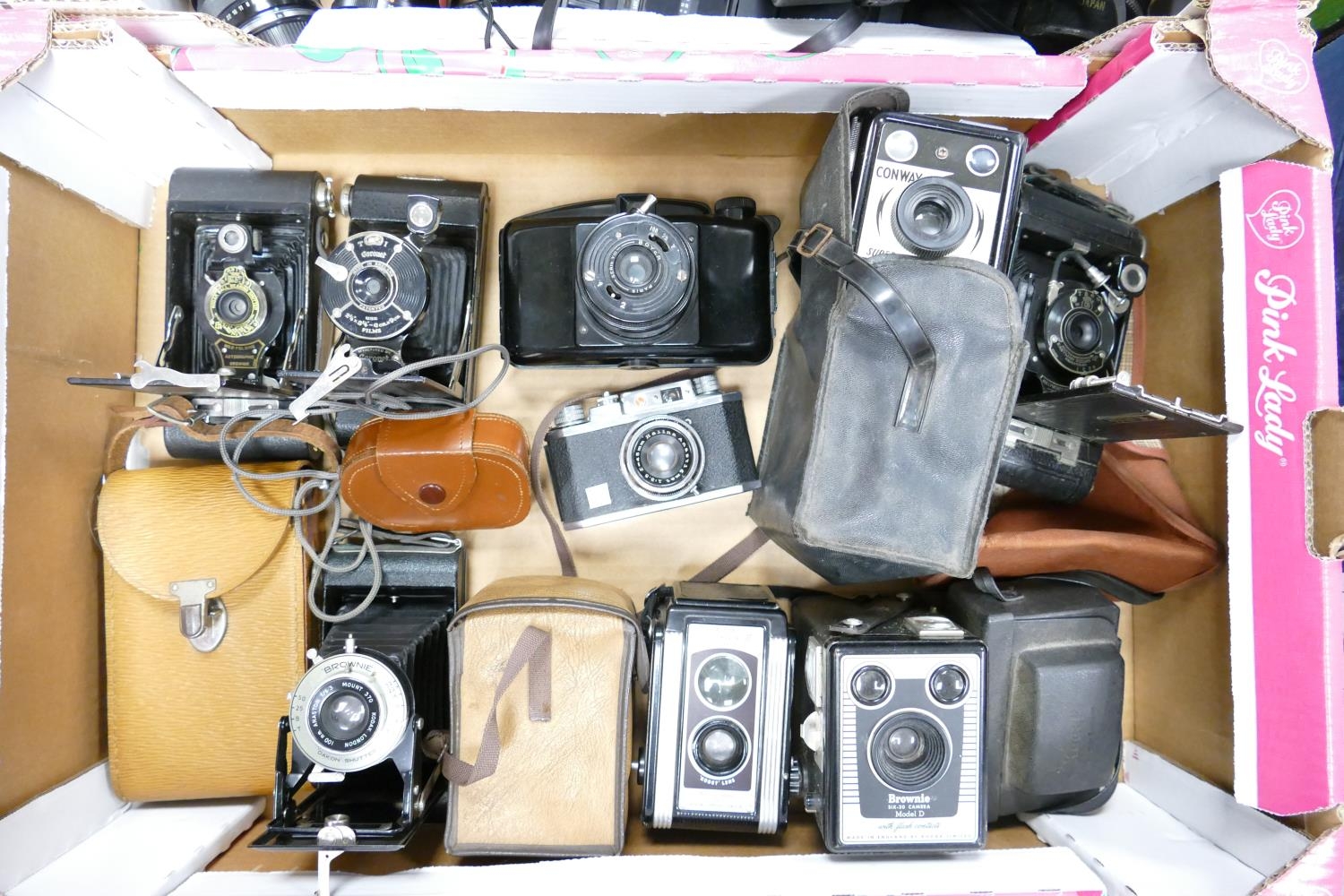 A collection of vintage 35mm film camera including: Halina 35x, Kodak Brownie bellows camera's,