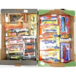 A collection of boxed toy cars: to include action city, cararama, western railway train, buses etc (