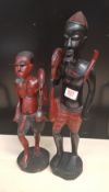 Two large African hardwood hand carved figures of tribal huntsmen: tallest 50cm in height.