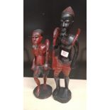 Two large African hardwood hand carved figures of tribal huntsmen: tallest 50cm in height.