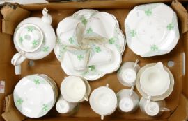 A collection of Art Deco hand decorated Grafton tea ware: ( tea pot damaged at spout) 42 pieces