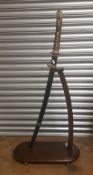 Vintage Japanese katana/sword and oak vertical stand: signed tang, Japanese WW2 handle fitted.