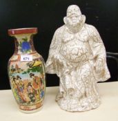 A large ceramic Buddha figure: together with an Oriental vase (2).