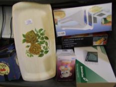 A mixed collection of items to include British gas electronic meter, boxed wooden steak knives sets,