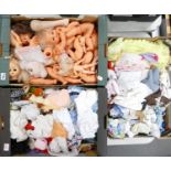 A large collection of dolls, doll parts doll clothing etc: (3 trays).