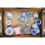 A collection of Wedgwood Blue Jasperware items to include: lidded pots, vases, eggs etc
