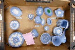 A collection of Wedgwood Blue Jasperware items to include: lidded pots, vases, eggs etc