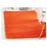 A brand new 'Unique Loom' branded rug: Solo Solid Shag Tiger Orange 245cm x 305cm.