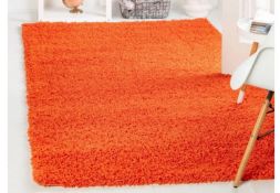 A brand new 'Unique Loom' branded rug: Solo Solid Shag Tiger Orange 245cm x 305cm.