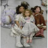 A collection of Leonardo Collection & similar Porcelain Headed Dolls(4)