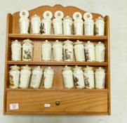 H J Hummel wooden framed spice rack and pots: 24 pots