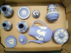 A collection of Wedgwood blue jasperware items to include: coffee pot, vases, table lighter etc (1