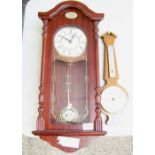 A reproduction wall hanging clock: together with a barometer (2).