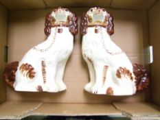 A pair of large hand painted Staffordshire dogs: height 30cm.