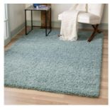 A brand new 'Unique Loom' branded rug: Solo Solid Shag Light slate blue 155cm x 245cm.