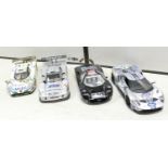 Four Maisto racing cars : to include 2017 Ford GT, Ford GT90, Mercedes CLK LM, Porsche 911GT1. scale