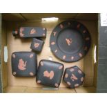 A collection of Wedgwood terracotta on black Egyptian theme items: (1 tray).