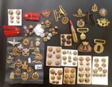 A good collection of military buttons and cap badges: together with other military collectables.