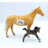 Beswick Palomino Huntsman's Horse 1484: together with a brown foal (2).