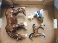 Beswick grazing shire together with a Beswick foal: and a Royal Doulton River Boy figure HN2128 (3).