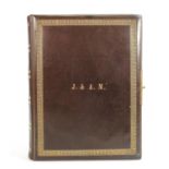 Victorian leather bound photograph Album: With brass lock and images of family portraits