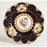 Hand decorated Henry Daniels cabinet plate with floral decorated panels: Diameter 22cm