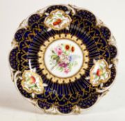Hand decorated Henry Daniels cabinet plate with floral decorated panels: Diameter 22cm