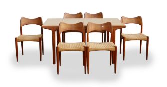 Mid century Danish extending dining table and six rush seated chairs: Complete with 2 additional