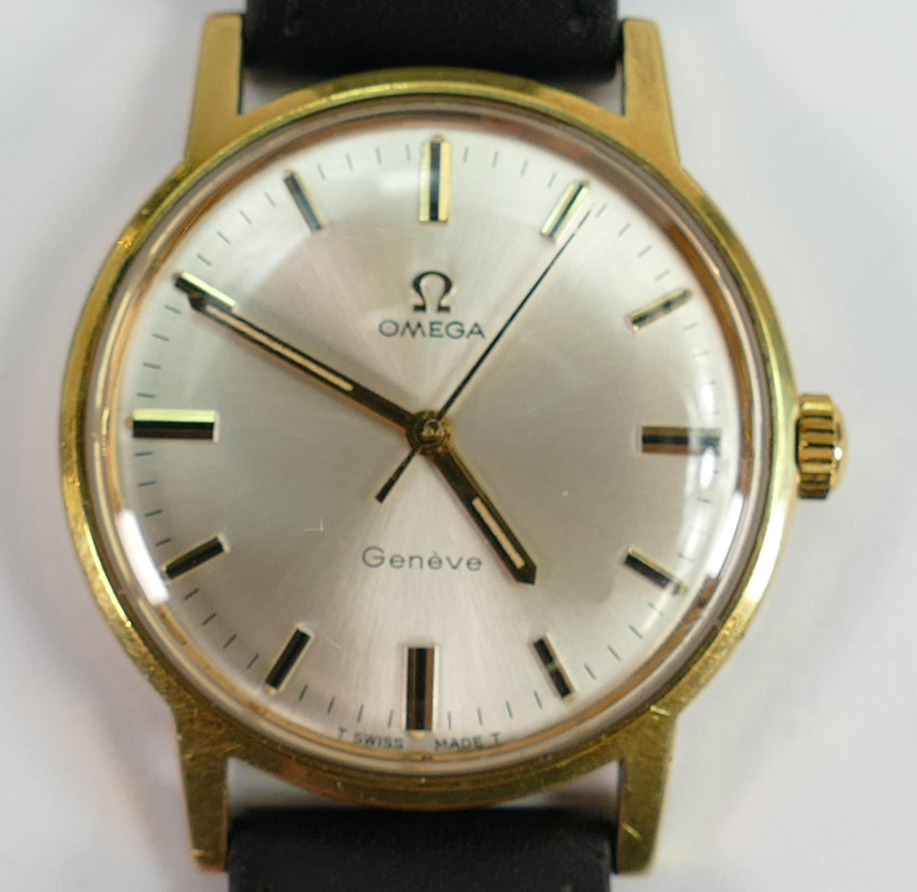 Omega Geneve manual gentlemans wrist watch: Circa late 1960s with leather strap.