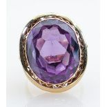 High carat ring set very large tanzanite amethyst or similar stone: The stone displays blueish