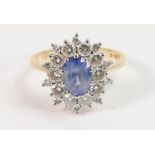 18ct gold sapphire and diamond cluster ring: Pale blue oval sapphire approx. 1.2ct, ring size M, 4.