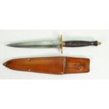 Fairbairn Sykes style bronze fighting knife: With brass hilt, in leather sheath, overall length 31.