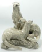 Peggy Davies large figure group of Three Otters: Gold signed to base, height 27cm