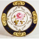 Hand decorated Henry Daniels cabinet plate with floral decorated panels: Diameter 21cm