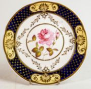 Hand decorated Henry Daniels cabinet plate with floral decorated panels: Diameter 21cm