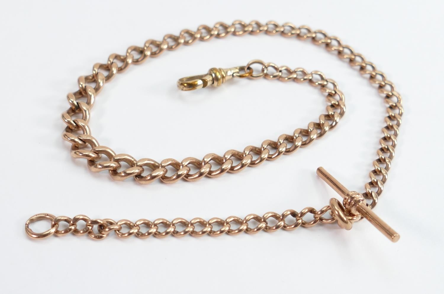 9ct rose gold single watch chain Albert: Measures 38.5cm long end to end. Hallmarked on every