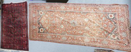 Two oriental rugs: Measuring 258cm x 137cm & 188cm x 96cm